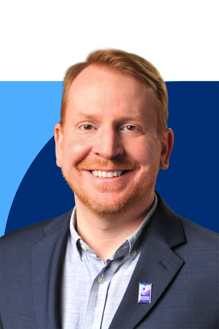 Justin Entzminger headshot - Our Team